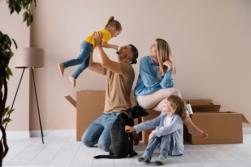 happy family moving into home nwls